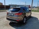 Hyundai Santa Fe 2013 года за 8 500 000 тг. в Атырау – фото 4