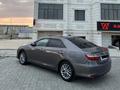 Toyota Camry 2016 года за 13 350 000 тг. в Жанаозен