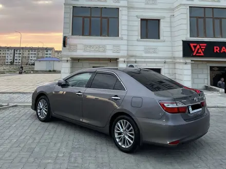 Toyota Camry 2016 года за 13 350 000 тг. в Жанаозен