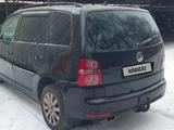 Volkswagen Touran 2007 года за 2 999 999 тг. в Алматы – фото 4