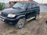 УАЗ Patriot 2012 года за 2 300 000 тг. в Атырау – фото 4