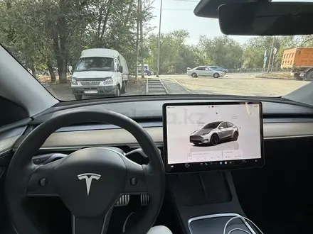 Tesla Model Y 2023 года за 16 490 000 тг. в Алматы – фото 11