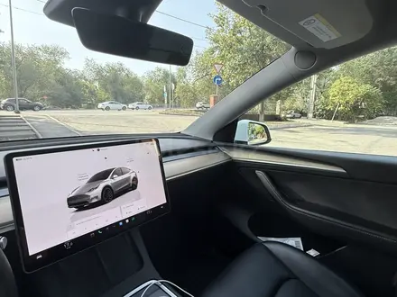 Tesla Model Y 2023 года за 16 490 000 тг. в Алматы – фото 12