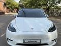 Tesla Model Y 2023 года за 16 490 000 тг. в Алматы
