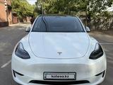 Tesla Model Y 2023 года за 16 490 000 тг. в Алматы