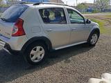 Renault Sandero 2014 года за 2 600 000 тг. в Актобе – фото 2