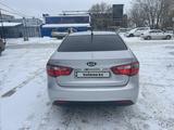 Kia Rio 2014 года за 4 800 000 тг. в Актобе – фото 2