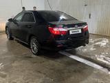 Toyota Camry 2014 года за 10 500 000 тг. в Уральск – фото 3