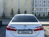 Toyota Corolla 2014 года за 6 800 000 тг. в Астана – фото 4