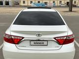 Toyota Camry 2015 года за 7 100 000 тг. в Жанаозен – фото 2