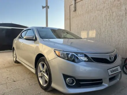 Toyota Camry 2014 года за 5 700 000 тг. в Жанаозен – фото 2