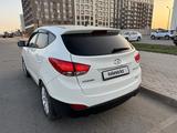 Hyundai Tucson 2012 годаүшін7 800 000 тг. в Караганда – фото 4