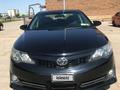 Toyota Camry 2013 годаfor7 800 000 тг. в Актобе