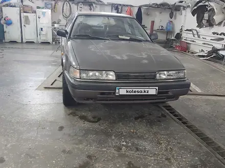 Mazda 626 1991 года за 550 000 тг. в Атырау – фото 2