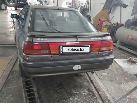 Mazda 626 1991 года за 550 000 тг. в Атырау – фото 4