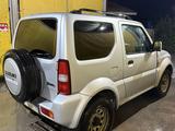Suzuki Jimny 2012 года за 3 800 000 тг. в Алматы – фото 4