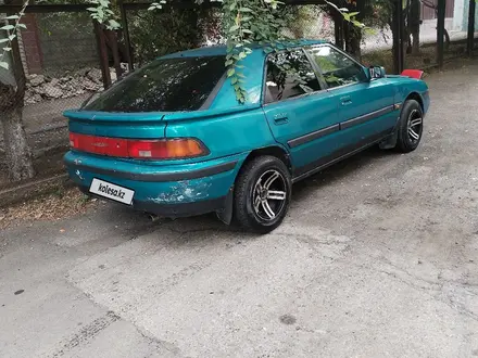 Mazda 323 1993 года за 570 000 тг. в Алматы – фото 6