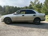 Mazda Familia 1997 годаүшін1 200 000 тг. в Риддер – фото 2