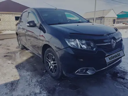 Renault Logan 2015 года за 3 700 000 тг. в Уральск – фото 9