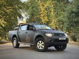 Mitsubishi L200 2014 года за 6 500 000 тг. в Алматы