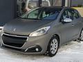 Peugeot 208 2012 года за 4 750 000 тг. в Караганда