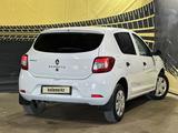 Renault Sandero 2015 годаүшін3 300 000 тг. в Актобе – фото 4