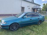 Toyota Carina E 1997 года за 1 800 000 тг. в Шымкент – фото 2