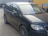 Volkswagen Touran 2007 года за 3 700 000 тг. в Алматы – фото 2