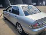Mitsubishi Lancer 2010 года за 1 990 000 тг. в Алматы – фото 4