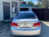 Chevrolet Cruze 2010 года за 2 550 000 тг. в Актобе – фото 4