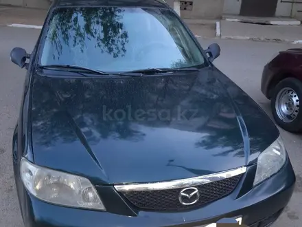 Mazda 323 2001 года за 2 000 000 тг. в Байконыр – фото 3