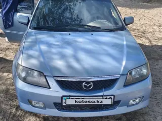 Mazda 323, 2002