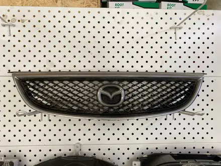 Решетка радиатора Mazda 626 2000 г. В. Оригинал. за 18 000 тг. в Караганда