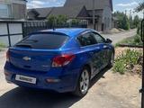 Chevrolet Cruze 2012 года за 1 800 000 тг. в Караганда – фото 4