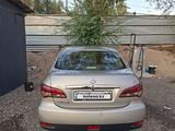 Nissan Almera 2014 года за 2 500 000 тг. в Алматы – фото 2