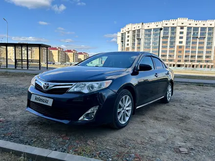 Toyota Camry 2014 года за 8 800 000 тг. в Актобе