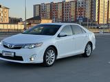 Toyota Camry 2013 года за 6 950 000 тг. в Атырау