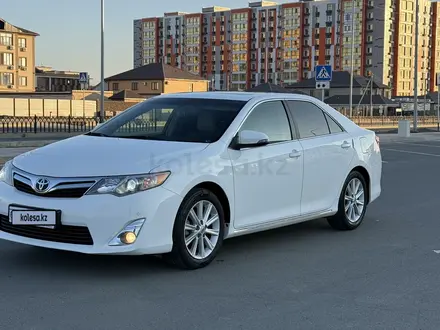 Toyota Camry 2013 года за 6 950 000 тг. в Атырау