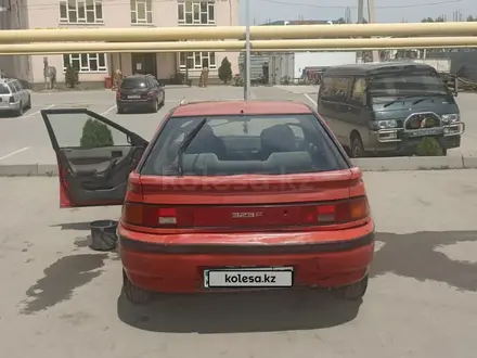 Mazda 323 1990 года за 550 000 тг. в Алматы – фото 2