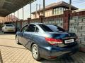 Nissan Almera 2014 года за 3 850 000 тг. в Алматы – фото 5