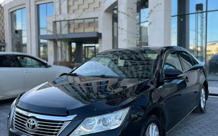 Toyota Camry 2014 года за 8 600 000 тг. в Астана