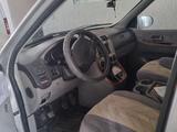 Kia Carnival 2004 года за 2 300 000 тг. в Шымкент – фото 4