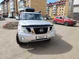 Nissan Patrol 2011 года за 9 500 000 тг. в Астана – фото 2