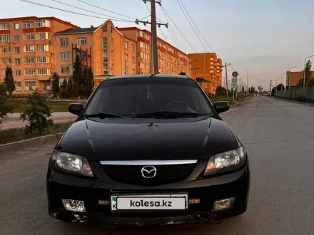 Mazda 323 2002 года за 2 200 000 тг. в Актобе – фото 2