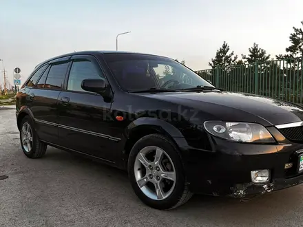 Mazda 323 2002 года за 2 200 000 тг. в Актобе – фото 7