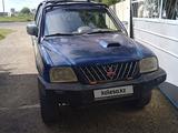 Mitsubishi L200 2003 годаүшін2 200 000 тг. в Есиль