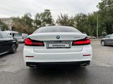 BMW 520 2022 года за 27 000 000 тг. в Алматы – фото 4