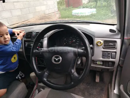 Mazda Demio 2002 года за 1 500 000 тг. в Актобе – фото 5