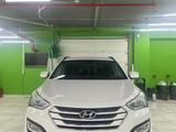 Hyundai Santa Fe 2014 года за 9 800 000 тг. в Астана