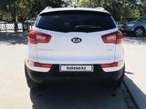 Kia Sportage 2013 года за 7 500 000 тг. в Шымкент – фото 4